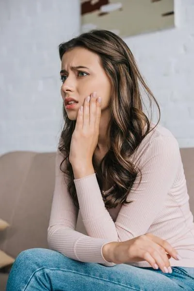 woman with tooth pain