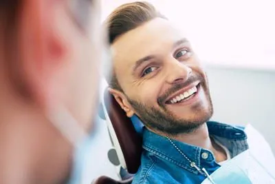 man smiling during his visit to Gaither Perio and Dental Implants