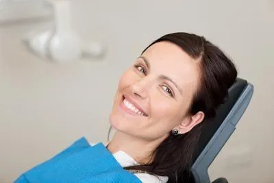 woman laying in dental chair at Gaither Perio and Dental Implants