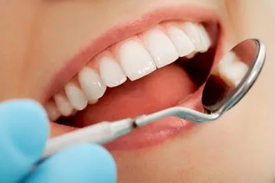 closeup of woman's smile at the dentist